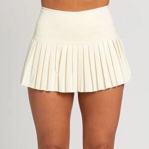GOLD HINGE PLEATED TENNIS SKIRT